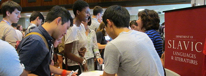 Andy Zhang and Clare Cavanagh greet undergrads at the Majors Fair